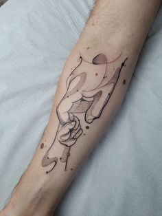 a person with a tattoo on their arm