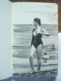 a pencil drawing of a woman in a bathing suit holding a frisbee on the beach