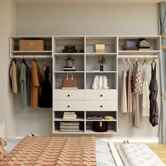 a bedroom with a bed, dresser and clothes on shelving units next to a window