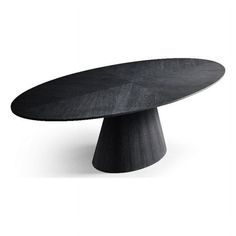 an oval table with black marble top on a white background in the shape of a cone