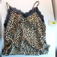 Love On A Hanger Brand Women's Cheetah Print Camisole Top. Lace Trim Detail, V-Neck Spaghetti Straps. Nwt, Smoke Free Home. Tags: Y2k, 2000s, Cheetah Print. Leopard Print, Animal Print, Lace, Tank Top, Girly, Feminine, Chic, Cami, Sexy Cheap Leopard Print Cami Tops, Floral Embroidery Top, Cold Shoulder Crop Top, Ruffle Long Sleeve Blouse, Black Sheer Top, Babydoll Style, Embroidery Top, Red Tank Tops, Black And White Tops