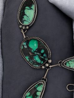 Elevate Your Style with Handmade EleganceIntroducing the Desert Row Handmade Lariat Necklace, an exquisite piece crafted with care and attention to detail. This stunning lariat-style necklace features seven vibrant green and black hand-cut variscite cabochons, each set in a sterling silver chain with a smooth satin finish. Whether you’re dressing up for a special occasion or adding a unique piece to your everyday look, this necklace is a versatile statement of elegance. We ship next business day Lariat Style Necklace, Black Hand, Vibrant Green, Lariat Necklace, Style Necklace, Green And Black, Sterling Silver Chain, The Desert, Satin Finish