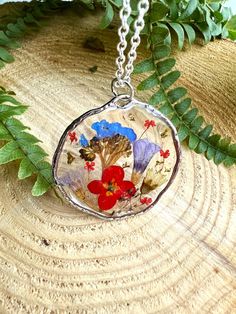 Handmade Epoxy resin necklace with real dried flowers. Made in the UK. Perfect and unusual gift idea. Comes beautifully presented in a gift box. Pendant material - alloy, hypoallergenic. Chain material:  sterling silver, silver plated, lightweight.  Stay close to nature with this necklace. Perfect happy summer necklace with bright colours flowers. Perfect anniversary, birthday or leaving gift.  Forget-me-nots symbolize true love and respect. When you give someone these tiny blooms, it represents Epoxy Necklace, Epoxy Resin Necklace, Morning Glory Flowers, Leaving Gifts, Unusual Gift, Forget Me Nots, Language Of Flowers, Summer Necklace, Resin Necklace