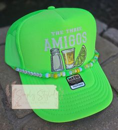 Who doesn't like a good margarita on a hot summer day?  If you prefer a different hat color or hat chain just message me.  I will be making different styles and colors of this hat style very soon!  Join my VIP Facebook group:  https://m.facebook.com/groups/647373030278085/?ref=share&mibextid=NSMWBT Website: shopsimply-styled.com Adjustable Flat Brim Trucker Hat For Summer, Summer Beach Brimmed Trucker Hat, Summer Beach Trucker Hat With Brim, Adjustable Hats For Cinco De Mayo Vacation, Fun Snapback Hat With Short Brim For Beach, Green Trucker Hat For Beach And Summer, Summer Festival Snapback Hat, Trendy Brimmed Summer Trucker Hat, Trendy Brimmed Trucker Hat For Summer