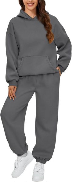 Plain hoodies tracksuit is crafted with high-quality materials, ensuringdurability and comfort. The fabric is soft and warm, providing a cozy feel on chilly days. It is available in sizes S-3XL, offering the fit for every body type. Womens 2 Piece Outfits, Fashion Sweatpants, Attractive Clothing, Drop Shoulder Hoodie, Sweatpants With Pockets, Sweatpants Style, Sweatsuit Set, Sweat Set, Quarter Zip Sweatshirt