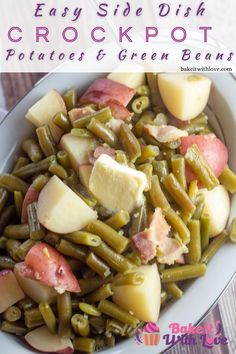 a white bowl filled with green beans, potatoes and ham on top of a wooden table