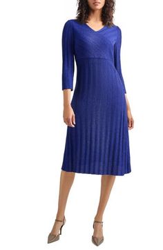 Step out in this sweater-dress decorated in textural stripes and designed in a timeless A-line silhouette that's perfect for any occasion. Surplice V-neck Three-quarter sleeves 56% acrylic, 33% nylon, 11% polyester Machine wash, dry flat Imported Elegant Ribbed Knee-length Sweater Dress, Formal Fitted Jacquard Knit Dress, Elegant Ribbed Workwear Dress, Chic A-line Ribbed Dress, Chic Ribbed A-line Dress, Elegant Evening Dresses In Jacquard Knit, Elegant Ribbed Dresses For Workwear, Elegant Ribbed Dress For Work, Fitted Textured Knit Midi Dress