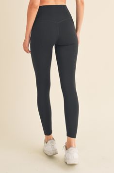 Here is a crossover leggings with eye-catching style and function! Highlight your waist with the flattering V-waistband and take on your day with confidence. A hidden phone pocket provides safe storage for all your needs!•High rise•V-waistband•Hidden phone pocket•Soft and stretchy•Full Length• ImportedComposition: 75% Nylon, 25% Spandex Black Yoga Pants With 5-inch Inseam For Gym, Tight Athleisure Leggings With Wide Waistband, Functional Leggings With Wide Waistband, Functional Tight Leggings With Wide Waistband, Black Tight Activewear With 5-inch Inseam, Mid-rise Leggings With Contoured Waistband For Sports, Fitted Activewear With Ribbed Waistband And 5-inch Inseam, Tight Functional Yoga Pants With Wide Waistband, High Waist Athleisure Leggings With Ribbed Waistband