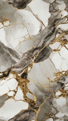 an abstract marble pattern with gold and silver accents on it's surface, as well as the colors