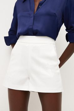 Elegant Essentials Start With A Premium Construction. Woven With Cotton For An Easy-Breezy Composition, These Shorts Have Classic Traits - By Way Of A High-Rise Waist, Pockets And Seamless Tailoring For A Luxurious Form. From Oversized Shirts To Boxy Blazers, This Piece Will Take You From Event To Event With Aesthetic Ease. Elegant Workwear Shorts For Spring, Elegant Spring Workwear Shorts, Chic Structured Summer Bottoms, Fitted Formal Shorts For Spring, Chic White Workwear Shorts, Chic Structured White Bottoms, Chic White Structured Bottoms, Elegant Solid Color Shorts For Workwear, Elegant Shorts For Workwear