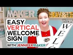 a woman in an apron holding up a sign that says easy vertical welcome sign with jennyner maker