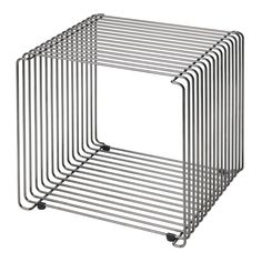 four metal racks stacked on each other in the shape of a square, with wheels attached to them