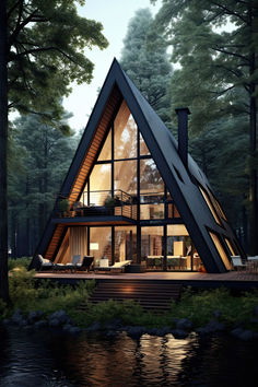 a - frame cabin in the woods is lit up at night with its windows open