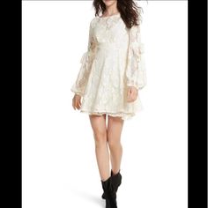 Free People Cream Victorian Lace Bell Dress Large With Tie Sleeves Store Price: $128 My Price: $75 (Reasonable Offers Considered) Color: Ivory Cream New Without Tags Size Large No Slip Approximate Measurements : Waist: 17.5” Pit To Pit: 19.5” Length From Top Of The Shoulder Bottom 31.5 Inches. Sleeves: From The Top Of The Shoulder To The Bottom, Approximately 25” Store Description: “The Lining Of This Dress Is In A Mico-Mini Length Delicate Sheer Lace Mini Fit And Flare Dress Featuring Solid Sat Bell Dress, Mini Tunic Dress, Balloon Sleeve Dress, Belle Dress, Cutout Maxi Dress, Tiered Ruffle Dress, Victorian Lace, Crochet Mini Dress, Dress Tunic