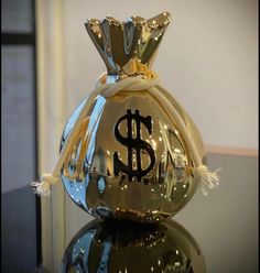 a glass bottle with a dollar sign on it