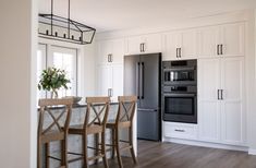 the kitchen is clean and ready to be used as a dining room or family room