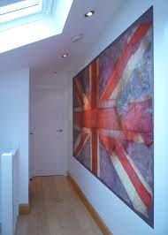 an image of a flag hanging on the wall next to a radiator and heater