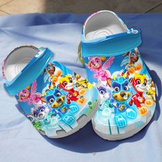 Cool Design Crocs Paw Patrol Squad Blue Clogs, Suitable Footwear for Kids And Adults Cute Blue Non-slip Clogs, Synthetic Slip-on Clogs For Playtime, Casual Blue Plastic Sandals, Blue Closed Toe Plastic Sandals, Blue Non-slip Plastic Sandals, White Non-slip Clogs For Playtime, Non-slip White Clogs For Playtime, Playful Plastic Clogs For The Beach, Playful Plastic Clogs For Beach