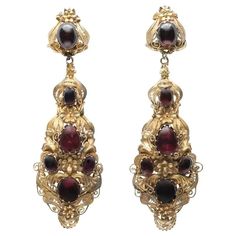 Early 19th Century Cabochon Garnet and 15 Karat Cannetille Drop Earrings For Sale at 1stDibs Victorian Baroque Earrings For Formal Occasions, Victorian Baroque Earrings, Antique Earrings With 17 Jewels For Ceremonial Occasions, Victorian Jewelry With Historical Design For Evening, Antique Wedding Cabochon Earrings, Formal Filigree Baroque Earrings, Formal Baroque Filigree Earrings, Victorian Evening Earrings With 17 Jewels, Victorian Earrings For Evening