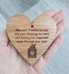 a heart shaped wooden plaque that says, may your troubles be less and your blessing be more and nothing but happiness come through your door