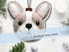 an ornament made to look like a french bulldog