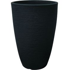 a large black vase sitting on top of a table