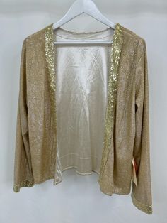 NWT. Cardigan/Jacket: Open Front. Long sleeves. Gold shimmer cardigan with sequin trim. Tank/Camisole: Straight neckline. Back zipper. Pants: Wide leg. Elastic on the side of the waistband. Back zipper. All: Lined. Care, size and material tags have bee removed. Brand = LT Lan Ting Bride Women Size = XL Color = BEIGE AND GOLD Item Number: 5074-2 Item ID: 372407 Category: 3-Piece w/pants Gold Cardigan For Party In Spring, Festive Gold Outerwear For Fall, Gold Cardigan For Spring Party, Gold Cardigan For Fall Party, Gold Cardigan For Winter Party, Fitted Gold Outerwear For Holiday, Gold Festive Outerwear For Spring, Gold Sequined Outerwear For Spring, Gold Holiday Outerwear For Parties