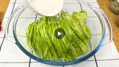 lettuce being prepared in a food processor