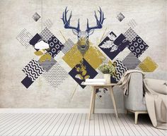 a living room with a deer head on the wall and an abstract geometric pattern behind it