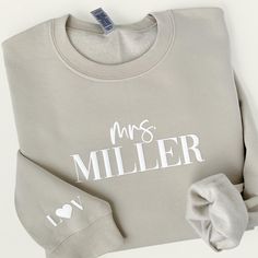 Mrs. Sweatshirt, Engagement Gift, Gift for Her, Bride to Be, Custom Sweatshirt, Wedding Gift, Ships Fast, PV3 Celebrate your engagement in style with our Personalized Mrs. Sweatshirt! This custom bride sweatshirt is the perfect choice for the bride-to-be, combining both fashion and custom personalization. With its monogrammed embossed puff text, this unique sweatshirt makes an unforgettable engagement gift and a timeless wedding keepsake. Ideal for those seeking a meaningful wedding gift, our Personalized minimalist Mrs. Sweatshirt doubles as a chic wifey sweatshirt and can be customized with your color sweatshirt and text for a personal touch that will be cherished for years to come. ★ Important★ Scroll through all photos to know how to place your order. All details can be found in our FA Wifey Sweatshirt, Mrs Sweatshirt, Bride Sweatshirt, Color Sweatshirt, Unique Sweatshirt, Couple Items, Wedding Keepsakes, Custom Sweatshirts, Timeless Wedding