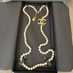 100% Authentic 2023a Beautiful Chanel Gold Tone Cc Logo Pearl Necklace. Size: Length Is 21" Total Length Closure At 42" And 44" Brand New In Box Without Tag! Elegant White Jewelry With Logo Charm, White Formal Jewelry With Logo Charm, Formal White Jewelry With Logo Charm, Elegant White Necklace With Logo Charm, Designer Everyday Luxury Necklace, Designer Necklaces For Everyday Luxury, Elegant Formal Necklace With Logo Charm, Chanel Pearl, Jewelry Chanel