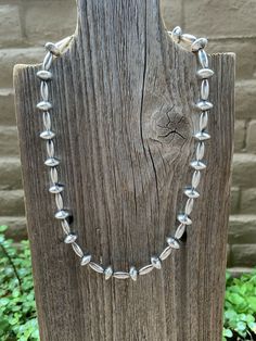 Check Out These Unique Navajo Sterling Silver Cone Beaded Necklaces (16 inches) Stamped Sterling. These Beads Are Great For Everyday Wear. **Only 1 beaded necklace included in price, shown is multiple necklaces for display purposes** Thank you for visiting our store, please let us know if you have any questions. SKU:333978245901_8a697d36-d6ad* Silver Beaded Necklace With Oval Beads, Silver Jewelry With Single Strand Oval Beads, Southwestern Silver Necklace With Large Beads, Southwestern Style Necklaces With Large Beads, Southwestern Style Silver Single Strand Necklace, Vintage Silver Hand-strung Beaded Necklace, Classic Beaded Jewelry With Oval Beads, Silver Oval Beads Single Strand, Silver Necklace With Oval Spacer Beads