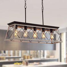 a light fixture hanging from the ceiling in a kitchen