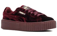 The Fenty x Puma Velvet Creeper in "Burgundy" is a must-have for any fashion-savvy woman. This luxurious shoe features a full maroon velvet upper with matching platform sole and gold branding. Released in December 2016, the sneaker dropped in a three-pack alongside "Black" and "Cement" colorways. Whether you're hitting the town or just lounging around, the Velvet Creeper is sure to make a statement. Add this stylish shoe to your collection today! Velvet Creepers, Fenty Creepers, Puma Creepers, Puma Fenty, Fenty X Puma, Streetwear Sneakers, Fenty Puma, Gold Branding, Royal Purple