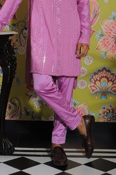 Flamingo pink kurta with mirror embroidery all over. Paired with a trouser.
Components: 2
Pattern: Embroidered
Type Of Work: Mirror
Neckline: Band collar
Sleeve Type: Long
Fabric: Silk, Stretch Cotton
Color: Pink
Occasion: Mehendi and Puja - Aza Fashions Pink Kurta, Mirror Embroidery, Flamingo Pink, Band Collar, Fabric Silk, Pink Silk, Embroidered Silk, Aza Fashion, Sleeve Type