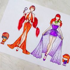 three paper dolls are shown on a piece of paper, one is wearing a purple dress and the other has red hair