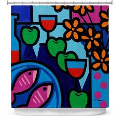 a colorful shower curtain with fish and flowers