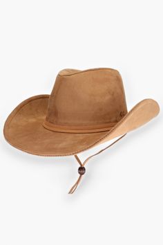 Step into the wild west with the Telluride Camel Suede Cowboy Hat ! Rocking a faux suede design, adjustable strap, and our signature logo burned into the side, this hat is all about blending style and comfort seamlessly. Whether you're hitting the rodeo or simply want to elevate your outfit, this trendy accessory is your go-to choice for a touch of western charm.   Features:   Faux suede design for a chic and rustic look.  Adjustable strap for a custom and comfortable fit.  Signature logo burned into the side for a personalized touch.  Camel color that adds a classic western vibe to any ensemble.  Perfect for rodeos, festivals, or casual outings with friends. Rugged Curved Brim Hat For Rodeo, Rugged Brimmed Hat For Rodeo, Rugged Flat Brim Hat For Rodeo, Distressed Brown Country Hat For Rodeo, Distressed Brown Wide Brim Hat For Rodeo, Country Style Distressed Brown Hat For Rodeo, Rugged Adjustable Fedora For Western-themed Events, Rugged Adjustable Brimmed Fedora, Rugged Adjustable Wide Brim Fedora