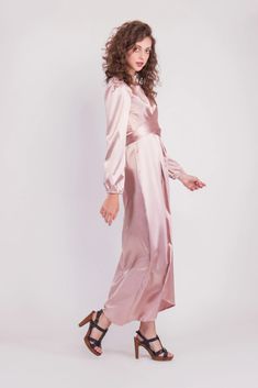 Feel more confident than ever before in the Satin Wrap Maxi Dress with Puff Sleeves that combines modesty with today’s most current modest fashion trends. The sleek satin maxi dress accentuates the waist with a luxurious wrap design while the puff sleeves accent a bold shoulder and feminine shape.Perfect for every special occasion, the unique dress comes in multiple colors to best fit your individual personality. Satin Maxi Dress With Side Slits, Belted Floor-length Maxi Dress, Elegant Satin Belted Maxi Dress, Elegant Belted Satin Maxi Dress, Satin Belted Midi Dress For Party, Pink Belted Midi Dress For Party, Party Satin Midi Dress With Belt, Spring Belted Floor-length Maxi Dress, Evening Belted Maxi Dress