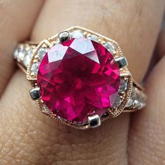 This Piece Is Everything A Girl Can Dream For. This Piece Is Made By Zales And Cost Almost 5k. The Ring Is Size 9, Crafted In Beautiful Natural Diamonds And The Center Ruby Is Lab Created But Is Huge And Keep The Value Up. Open To Trade. Pink Gold Round Ruby Ring With Prong Setting, Pink Gold Ruby Ring With Prong Setting, Formal Red Ruby Ring With Round Cut, Formal Ruby Ring With Round Accent Stones, Pink Gold Ruby Ring, Formal Rose Gold Ruby Ring, Luxury Red Ruby Ring, Diamond-cut Ruby Ring, Elegant Red Diamond-cut Ruby Ring