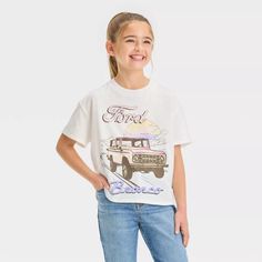 Girls' Ford Bronco Boxy Short Sleeve Cropped Graphic T-shirt - Ivory : Target Bronco Shirt, Ford Girl, Linen Tank Top, Fits Clothes, Tie Dye Designs, Cropped T Shirt, Tshirt Outfits, Kids Outfits Girls, Ford Bronco