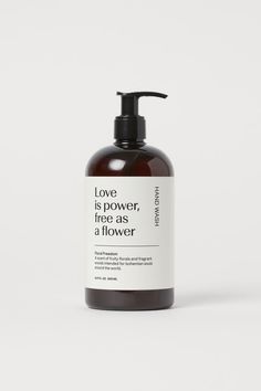 a bottle of liquid that says love is power, free as a flower