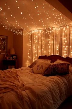 a bedroom with lights on the ceiling and a bed