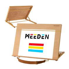 an open wooden box with the word meden printed on it