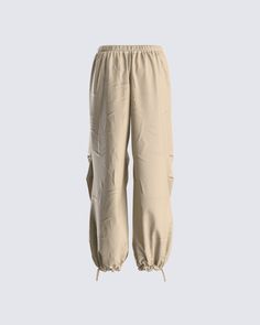 Parachute pants are a baddie essential, we don't make the rules 😜 Made with cargo pockets, an elastic waistband, and a functional drawcord for an adjustable look that is comfy, yet stylish 🖤 Urban Style Summer Cargo Pants With Elastic Waistband, Utility Cargo Pants For Loungewear, Relaxed Fit Ankle-length Cargo Pants For Outdoor, Trendy Solid Color Joggers With Drawstring, Casual Solid Cargo Pants With Pockets, Casual Solid Cargo Pants With Cargo Pockets, Baggy Utility Cargo Pants With Elastic Waistband, Trendy Drawstring Joggers, Utility Style Loungewear Pants With Multiple Pockets