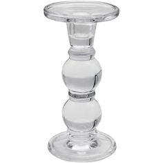 a clear glass candle holder on a white background