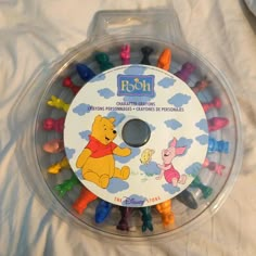 there is a clear plastic case with winnie the pooh on it