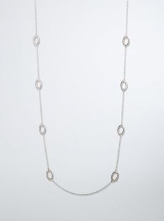 Oh-my-oval! This is the layering necklace that your accessories collection has been waiting for. A long style that is just the right amount of delicate, the silver tone chain has pavé oval pendants, adding some glimmer to your look. Lobster clasp. 32” long. Base metals. Imported. The best plus size women's long pavé oval necklace necklaces in silver. These dressy clothes and work-wear, office-wear, career-wear, and business-wear will make you look professional to nail your job interview and wear Elegant Oval Sterling Silver Chain Necklace, Silver Oval Chain Necklace, Oval Sterling Silver Chain Necklace, Everyday Silver Oval Pendant Chain Necklace, Silver Oval Delicate Chain Necklace, Silver Oval Necklace For Everyday, Everyday Silver Oval Necklace, Dressy Clothes, Oval Necklace