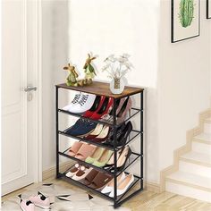 the shoe rack is holding many pairs of shoes