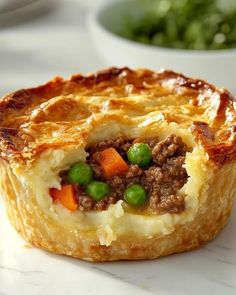 a meat and vegetable pot pie on a table